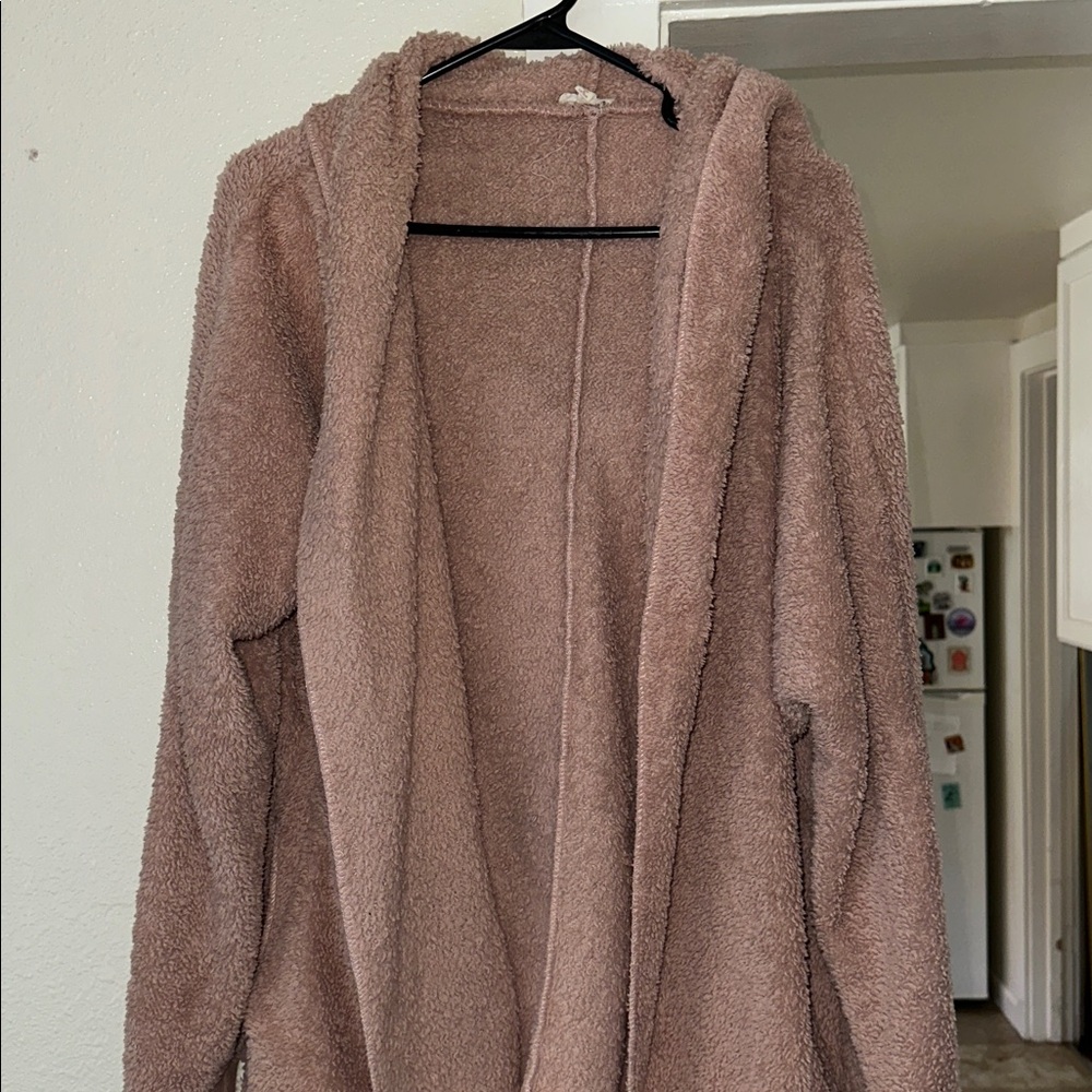 Blush pink soft hooded sweater. Has pockets. One size